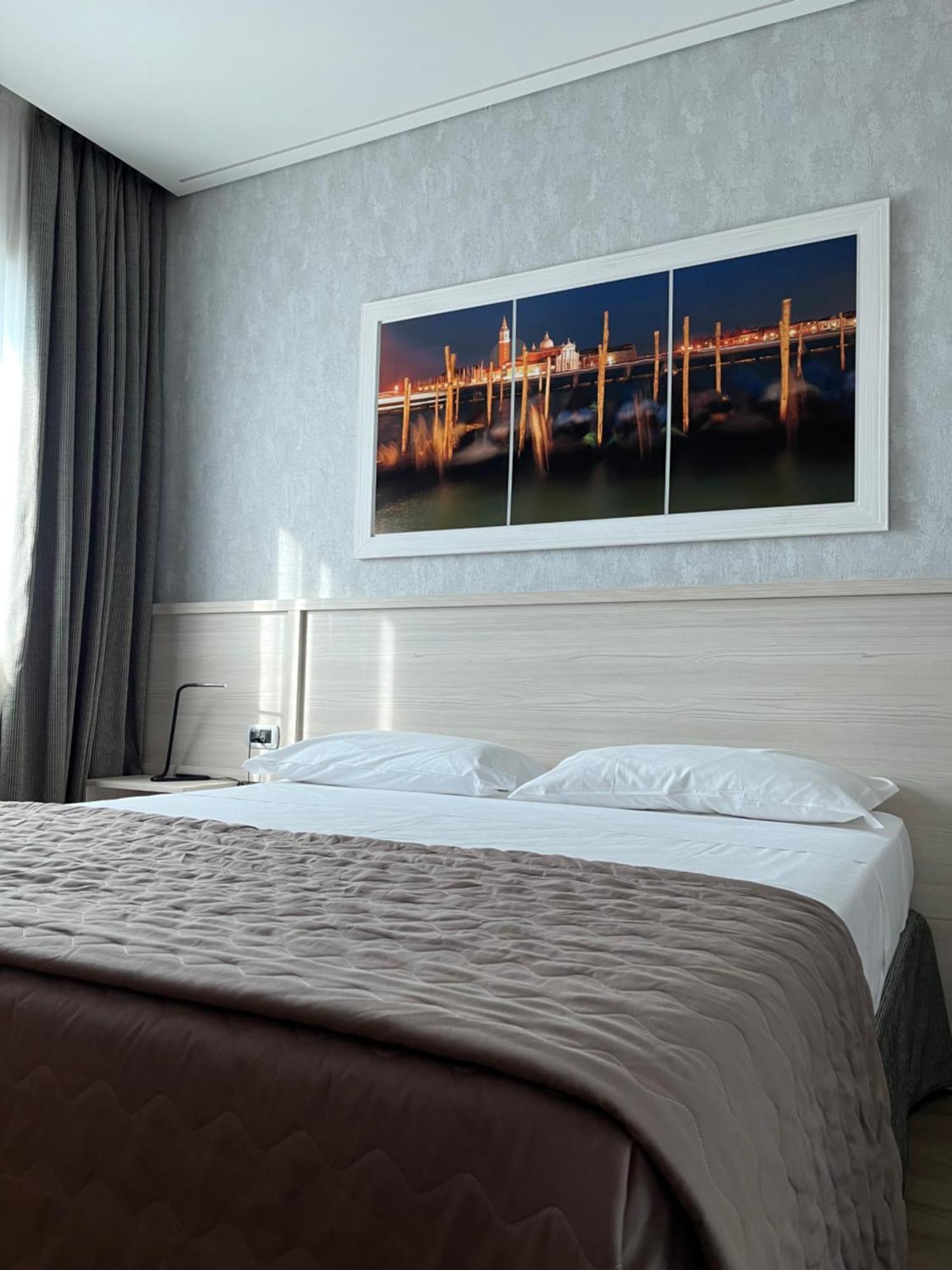 Hotel Poppi Mira Bagian luar foto